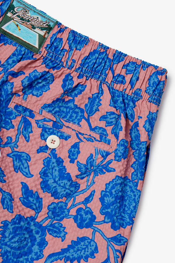 CORAL FLOWER SWIM TRUNKS