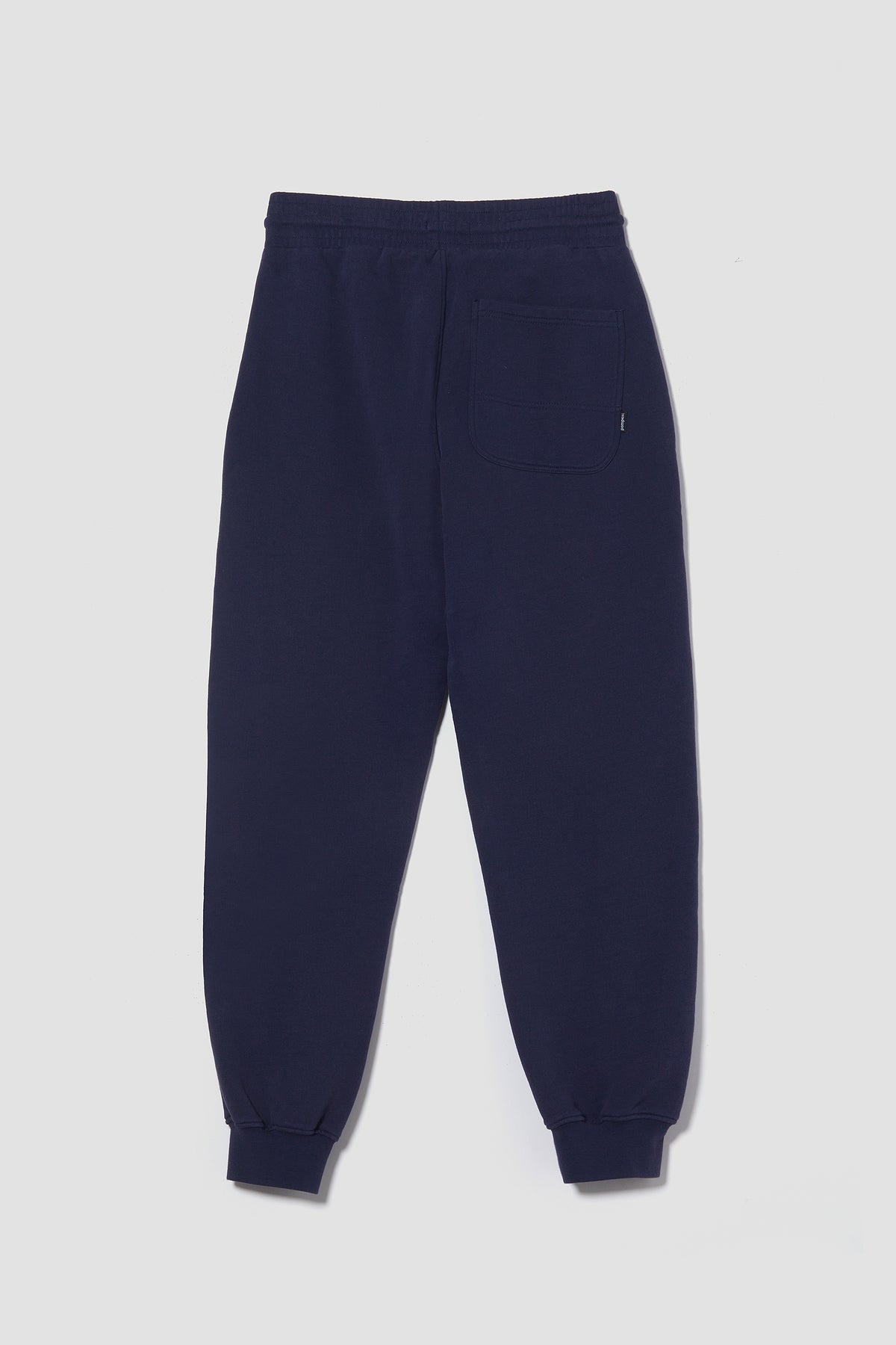 EL PANTALÓN DE SUDADERA AZUL MARINO